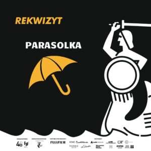 grafik z syrenką warszawską i żółta parasolką. W lewym górnym rogu napis rekwizyt, poniżej napis parasolka.